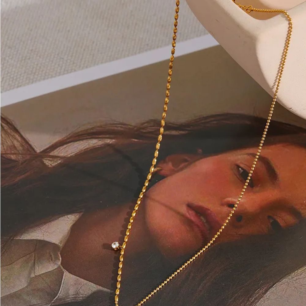 The Nganoú Necklace, 18K Gold Plated Stainless Steel with Shell Pendant in Geometric Design | The OÓ Jewels